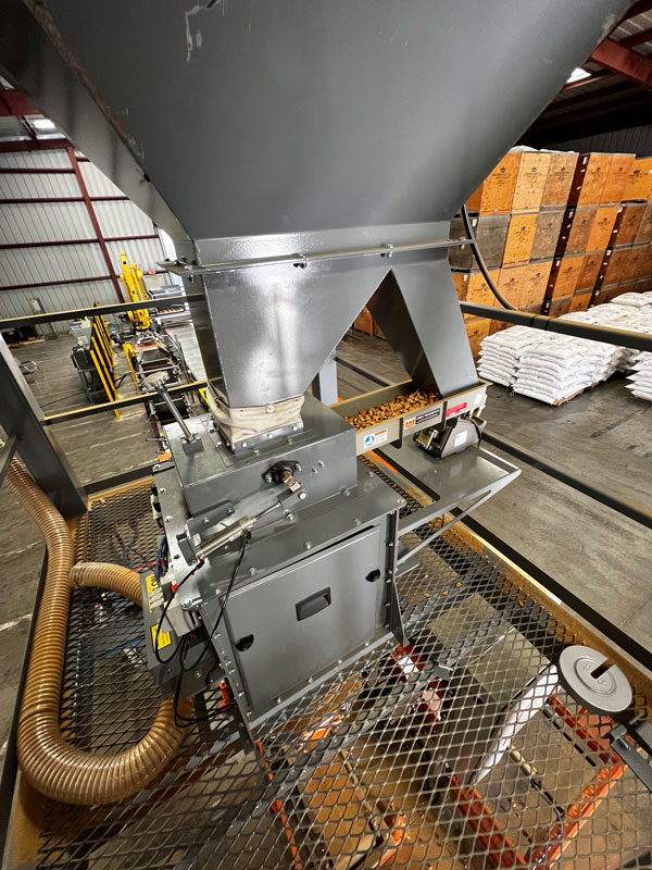 feeder with gravity gate and weigh hopper