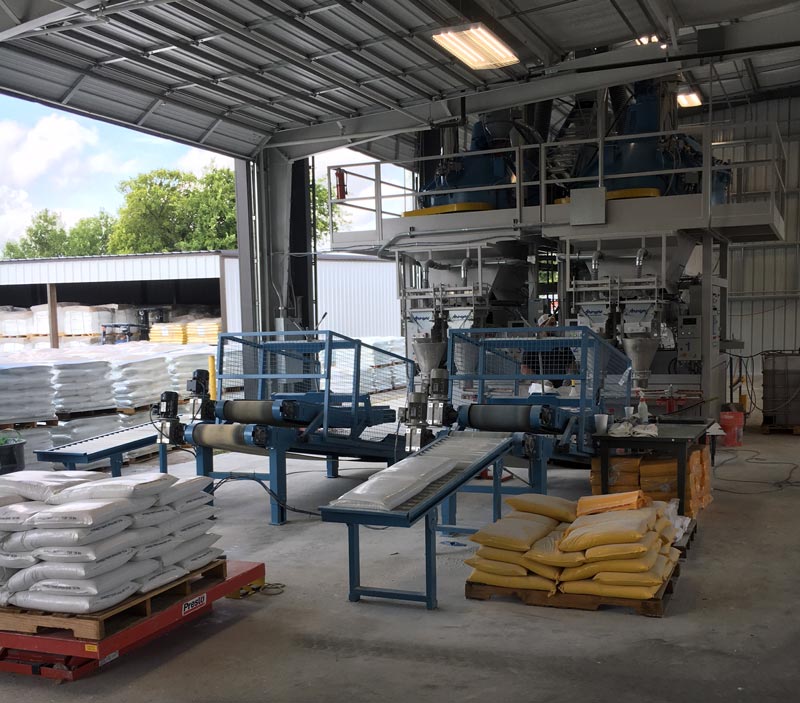 bag flattener conveyors to accumulation roller conveyors