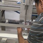 vacuum sealer with nitrogen gas flush and conveyor for bags of ground coffee mps 7503 001