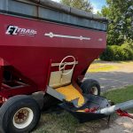 Corn Discharging from Farm Wagon into Hopper of Auger Conveyor