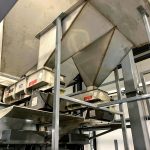 full flow and dribble flow feeders metering material into weigh hoppers