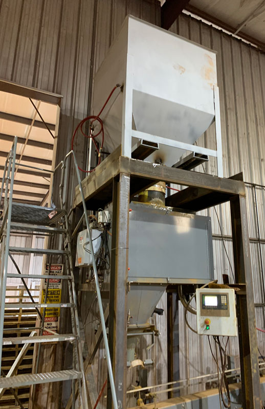 IBC-on-top-of-5-pound-bag-filler-for-limestone-and-pigment-powder