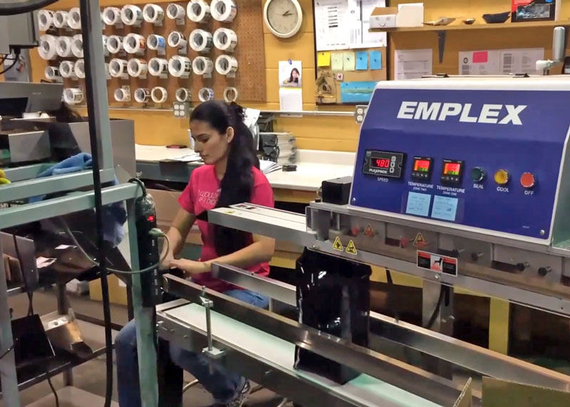 sealing bags of coffee