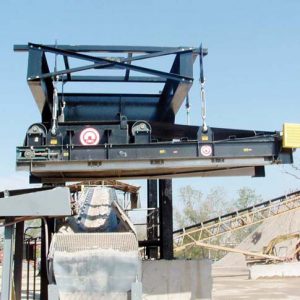 self cleaning electromagnet over conveyor belt - side view