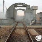 Dry Fog™ dust suppression system for rail car loading station