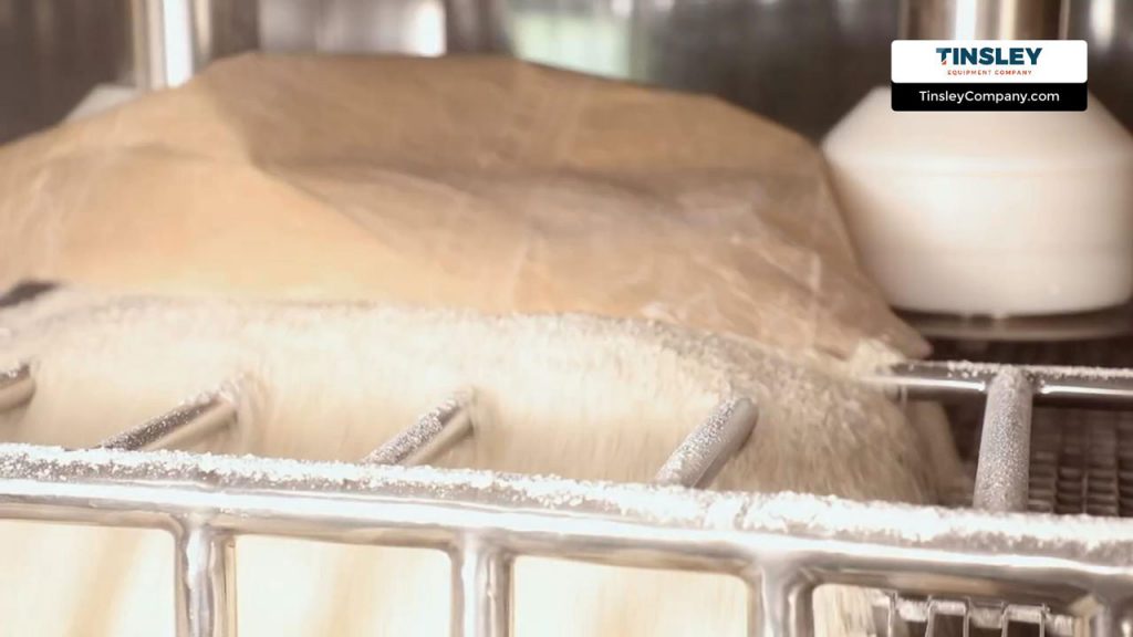 Material from bag being emptied