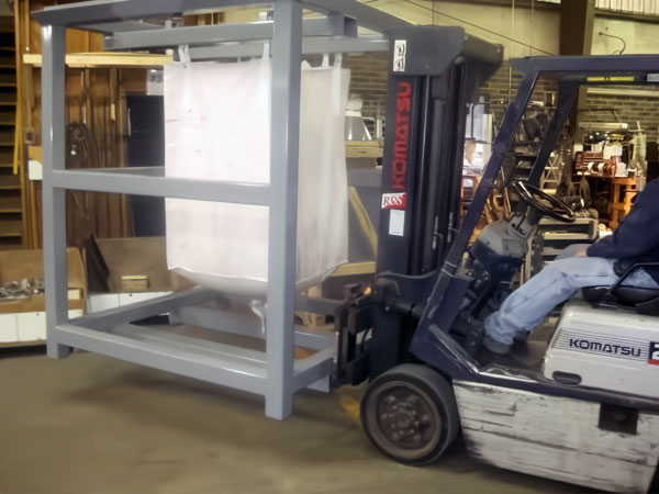 fork lift raising bulk tote bag lifting frame and cage off floor