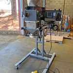open mouth bagging machine on portable stand with casters