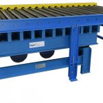 vibrating grid deck table under roller conveyor