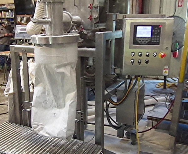Filling 50 lb bags with milk powder
