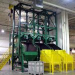 3 bulk bag dispensers with overhead rail hoist and hoppers below