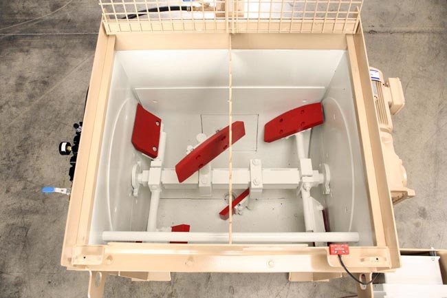 Interior view of single shaft paddle mixer for dust processing