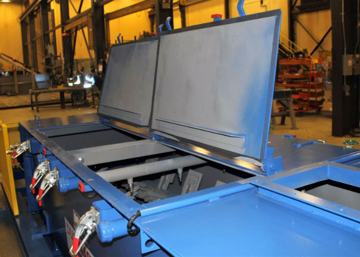 Pug mill mixer with access doors open