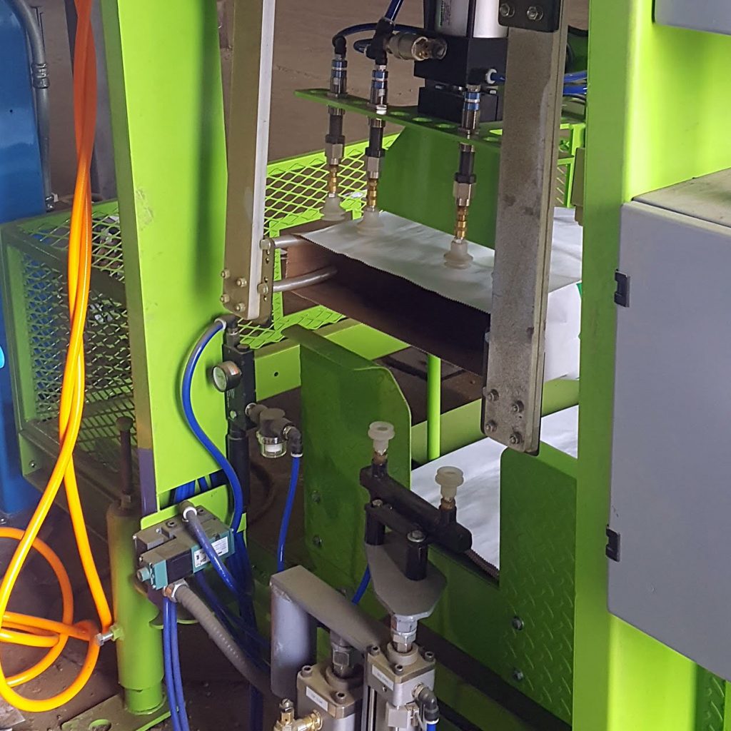 automatic bag placer machine for feed and grain bagging system