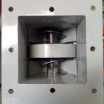 Opposing Twin Feed Screws Convey Material to Impeller