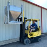 IBC container being raised by forklift
